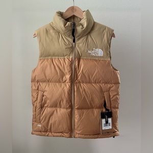 The North Face Women’s 96 Retro Nptse Vest in Almndbtr / Khkstn